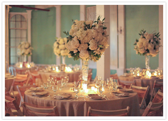 The menu cards and table numbers books wrapped with twine