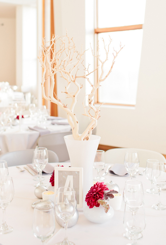 fuchsia florals and branch centerpieces 