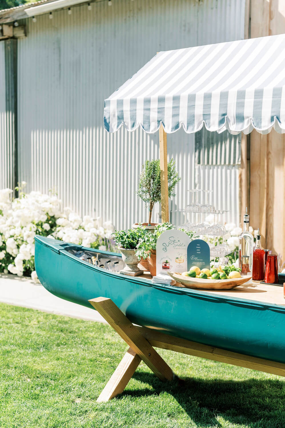 Canoe bar at rustic garden wedding