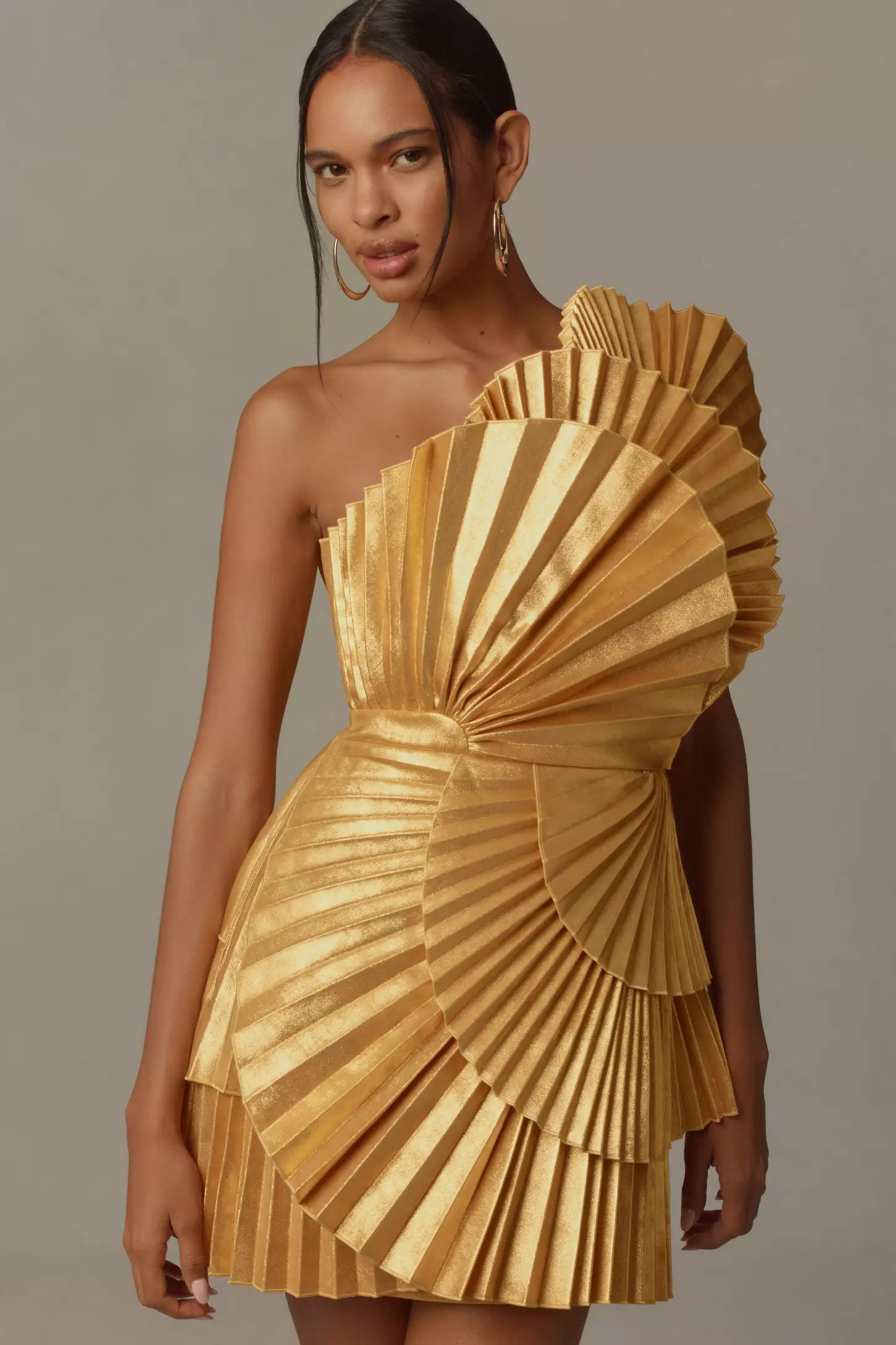 stylish gold pleated fall wedding guest dress from anthropologie