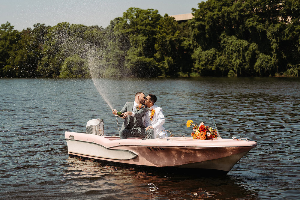 wedding portrait at Retro Boat Rental's pail-pink boat, “Gidget"