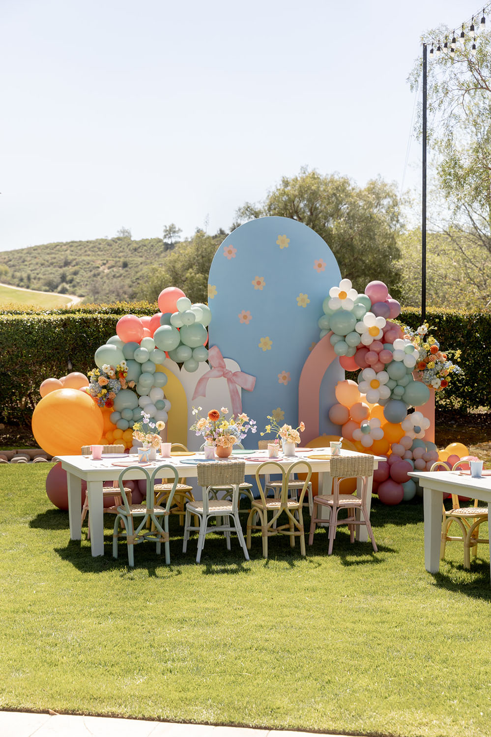 pastel balloon backdrop and table for spring kids party