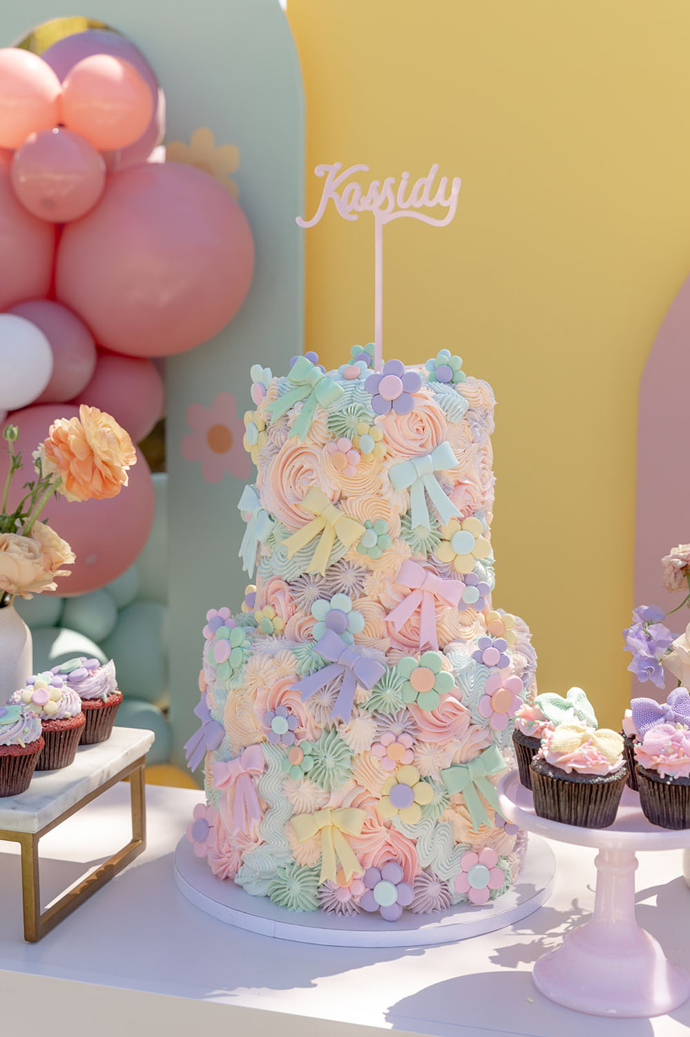colorful pastel bow themed birthday cake