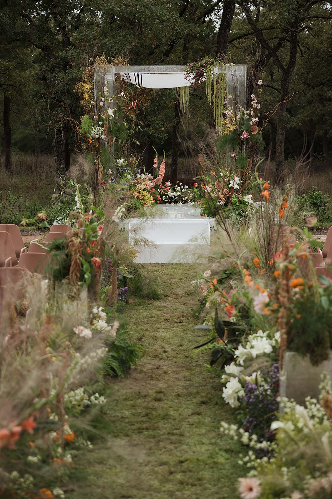 lush wedding ceremony and floral chuppah for The Grand Lady Austin wedding