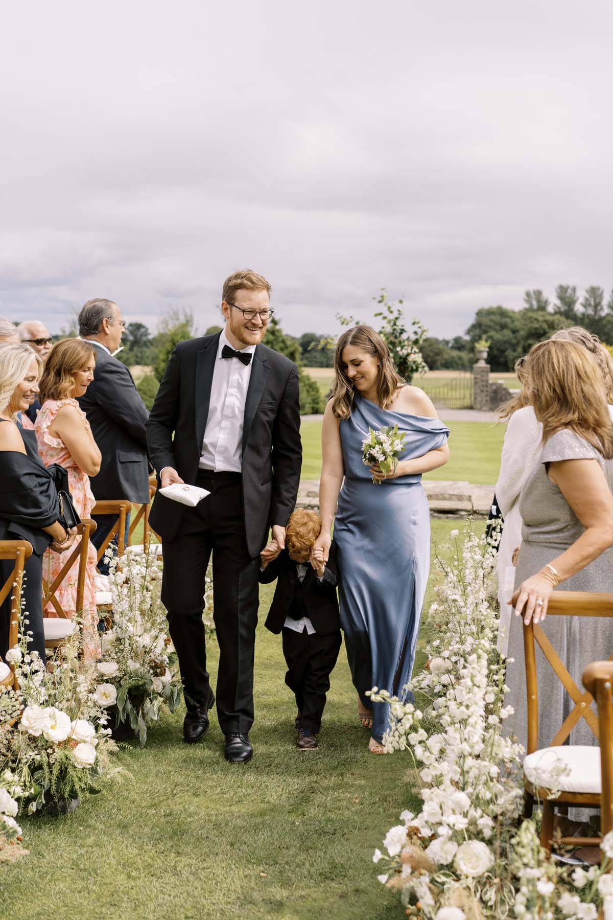 ring bearer at castle wedding ceremony