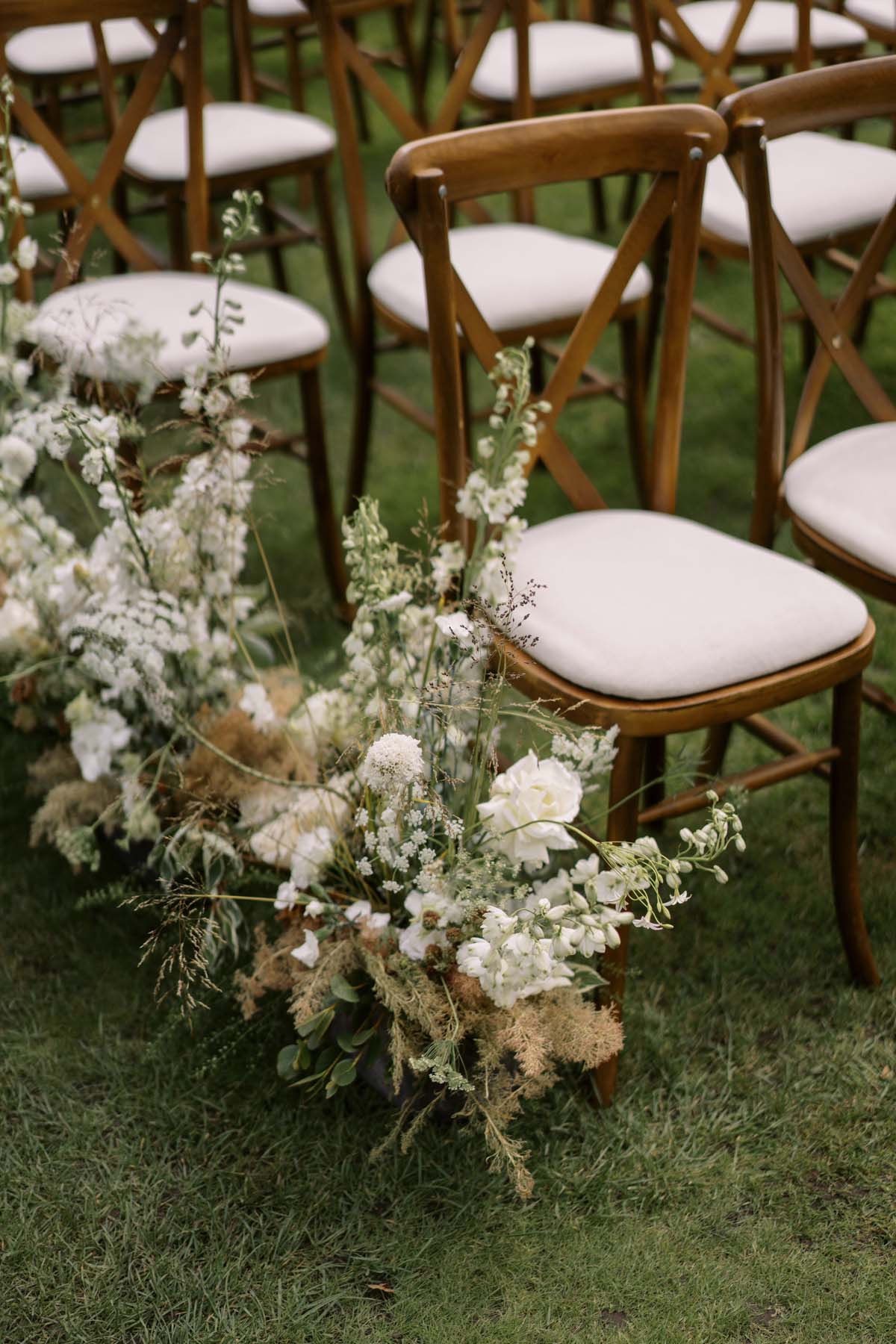 white floral arrangements for wedding ceremony