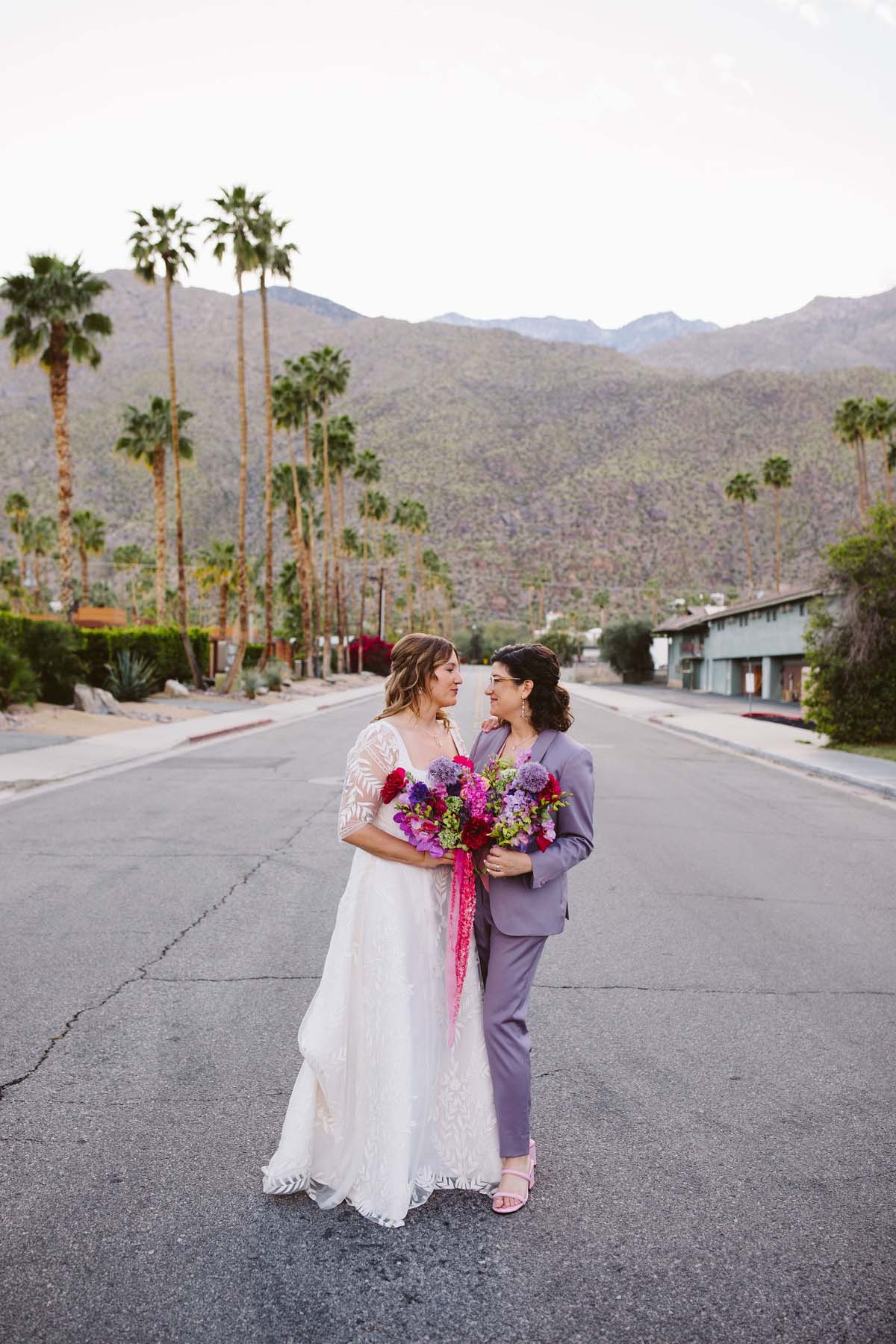 pink and purple lesbian wedding portraits at palm springs