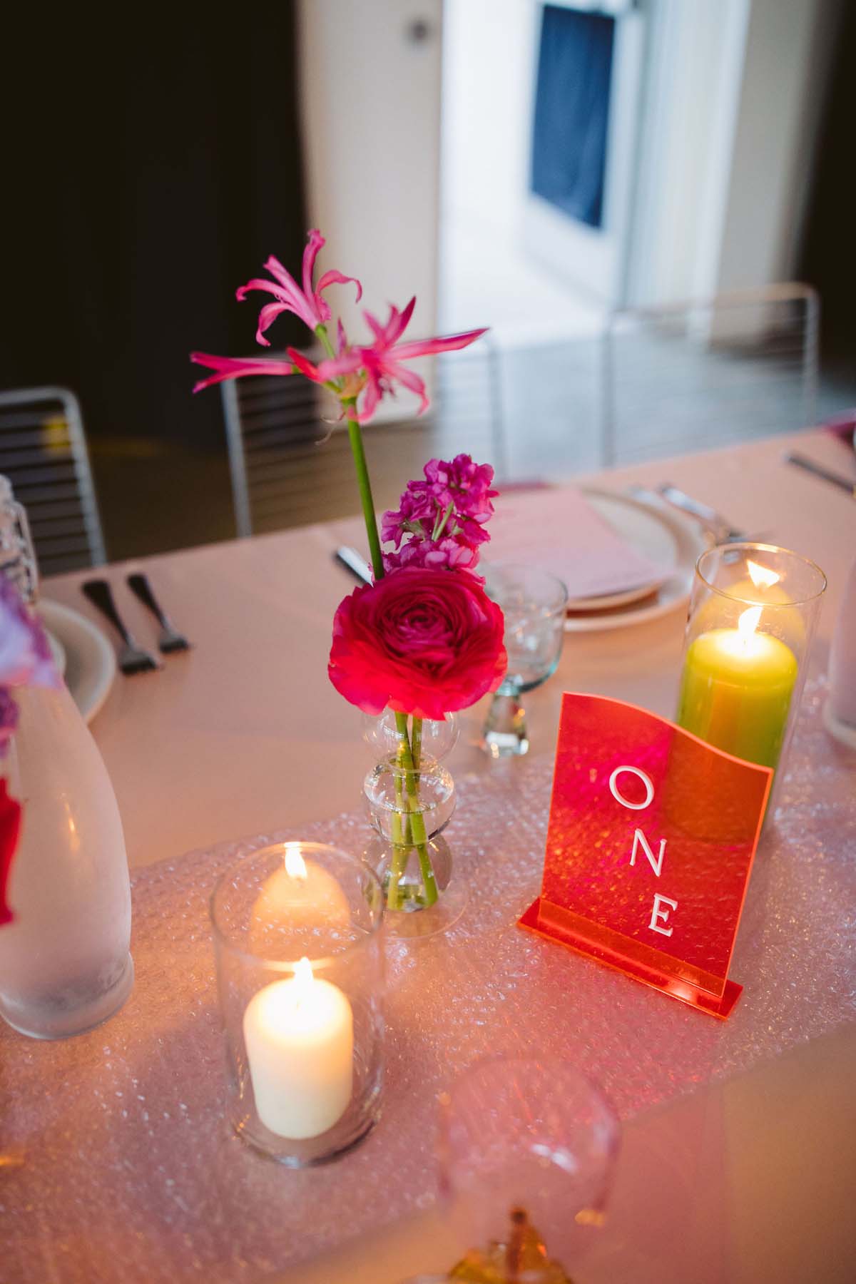 hot pink wedding flowers and sign