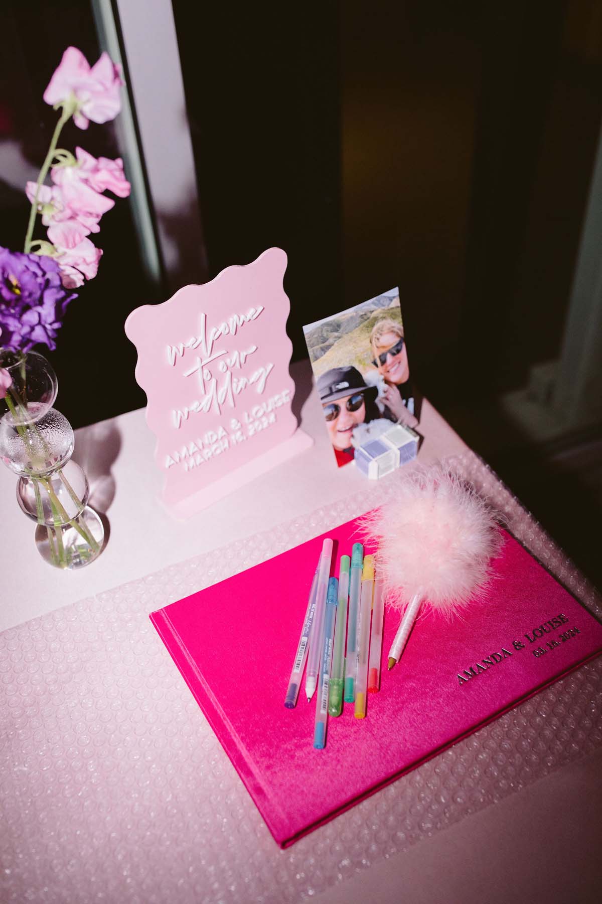 pink y2k inspired wedding decor and guest book