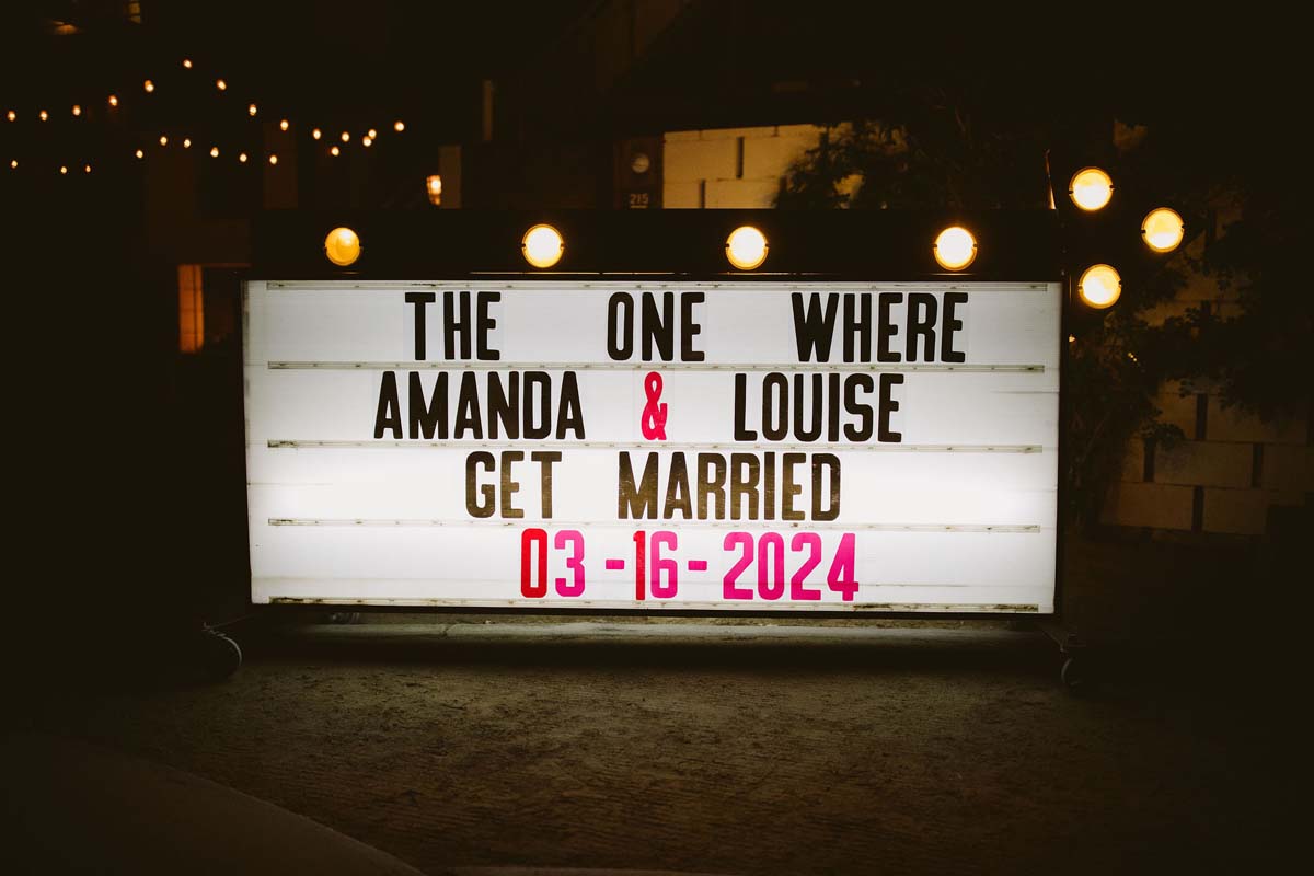 Friends inspired sign at y2k wedding