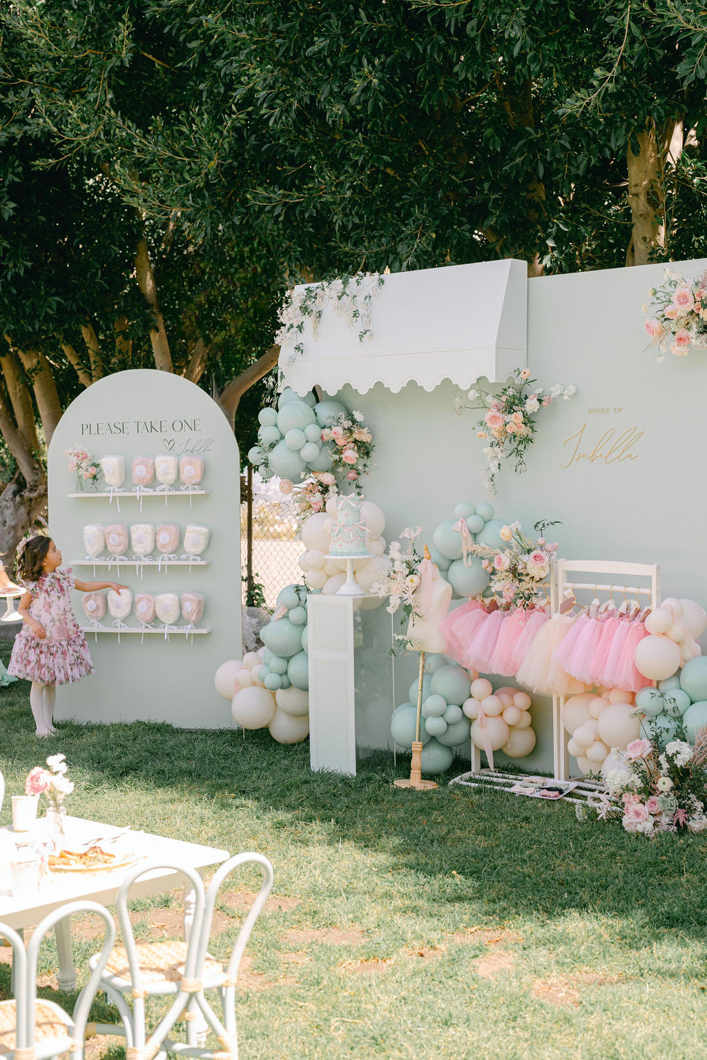 balloon decor and tutus for pink and mint parisian girls birthday party