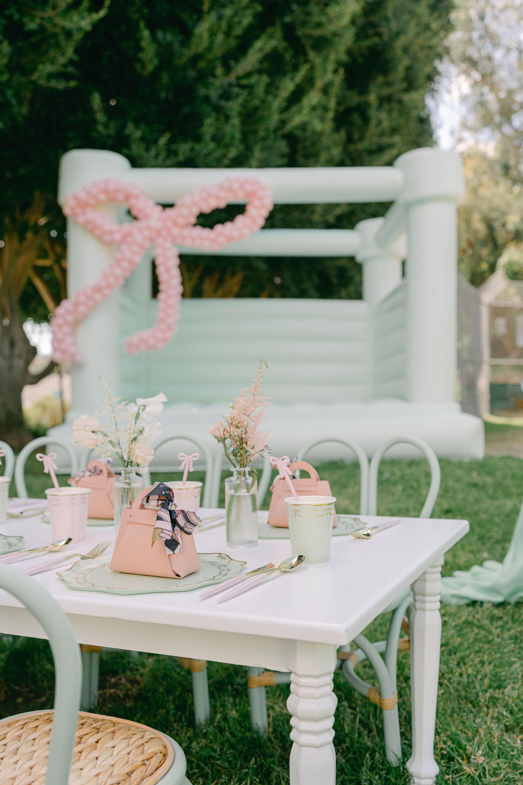 balloon decor and tutus for pink and mint parisian girls birthday party