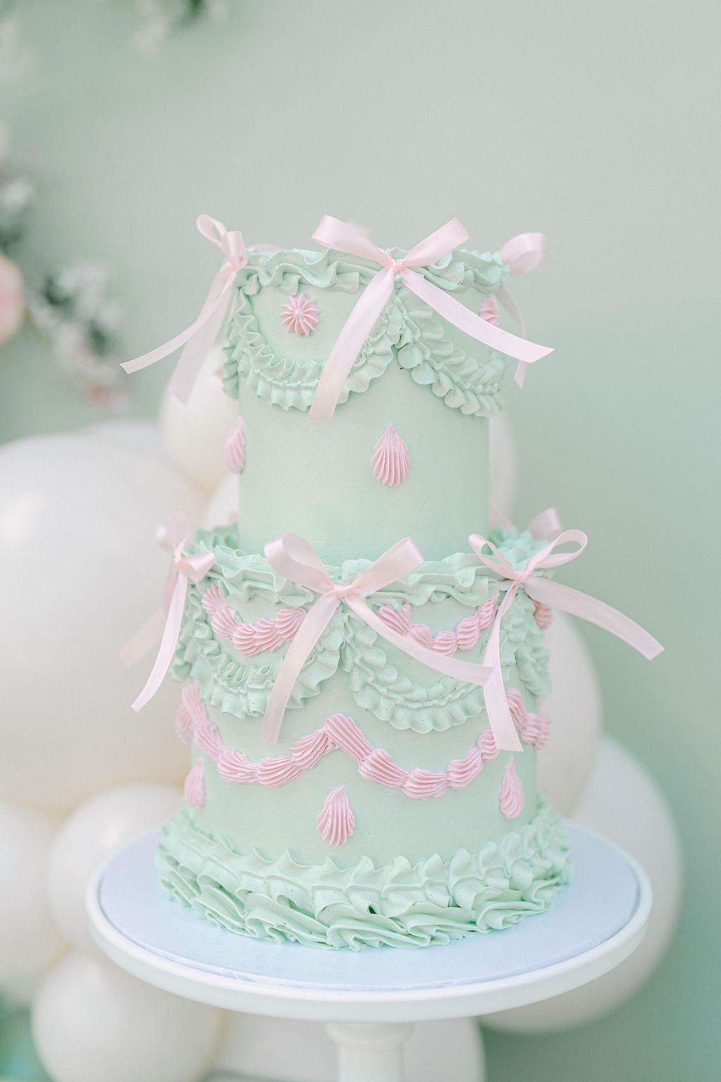 pastel girls birthday cake - mint green with pink bows