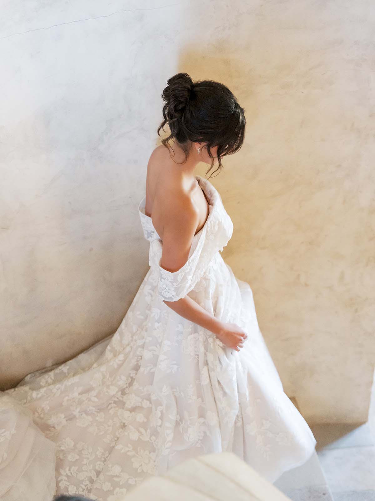 bride wearing lace dress at Sunstone Villa wedding