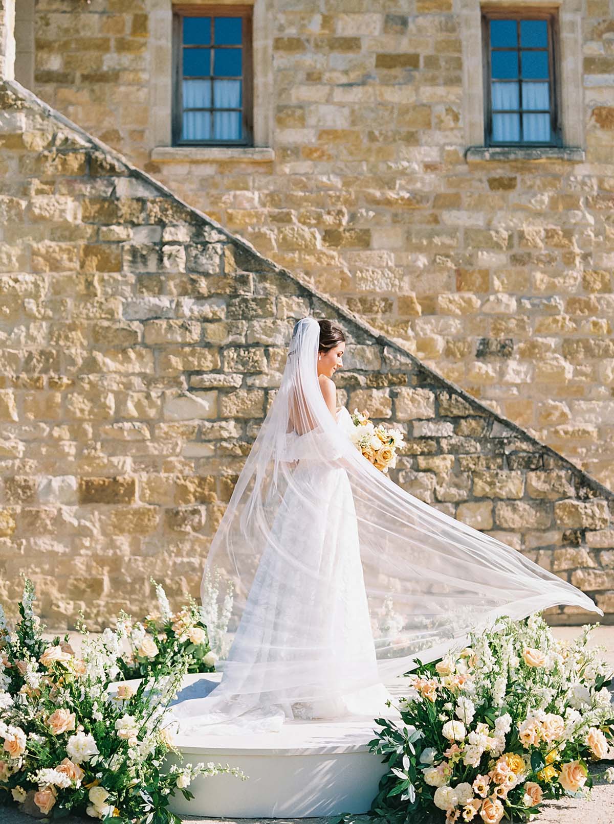 bride wearing lace dress at Sunstone Villa wedding