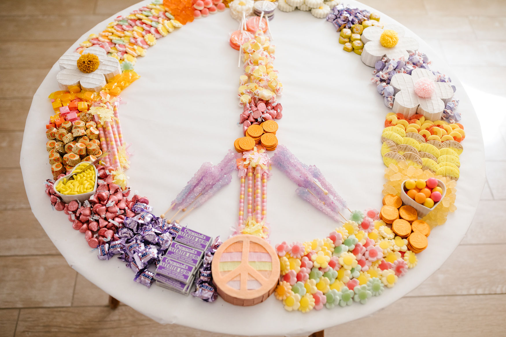 giant candy table rainbow peace sign