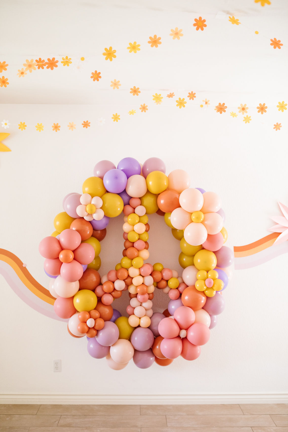 colorful balloon peace sign for 70s party decor