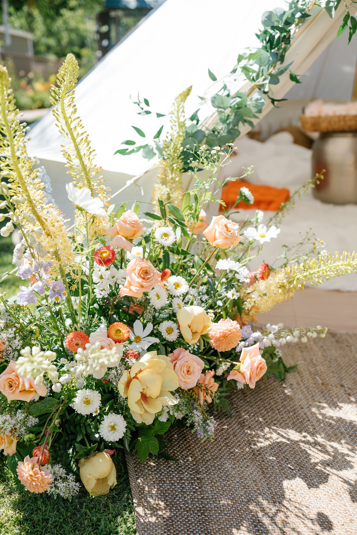 groovy summer floral arrangements for boho tent