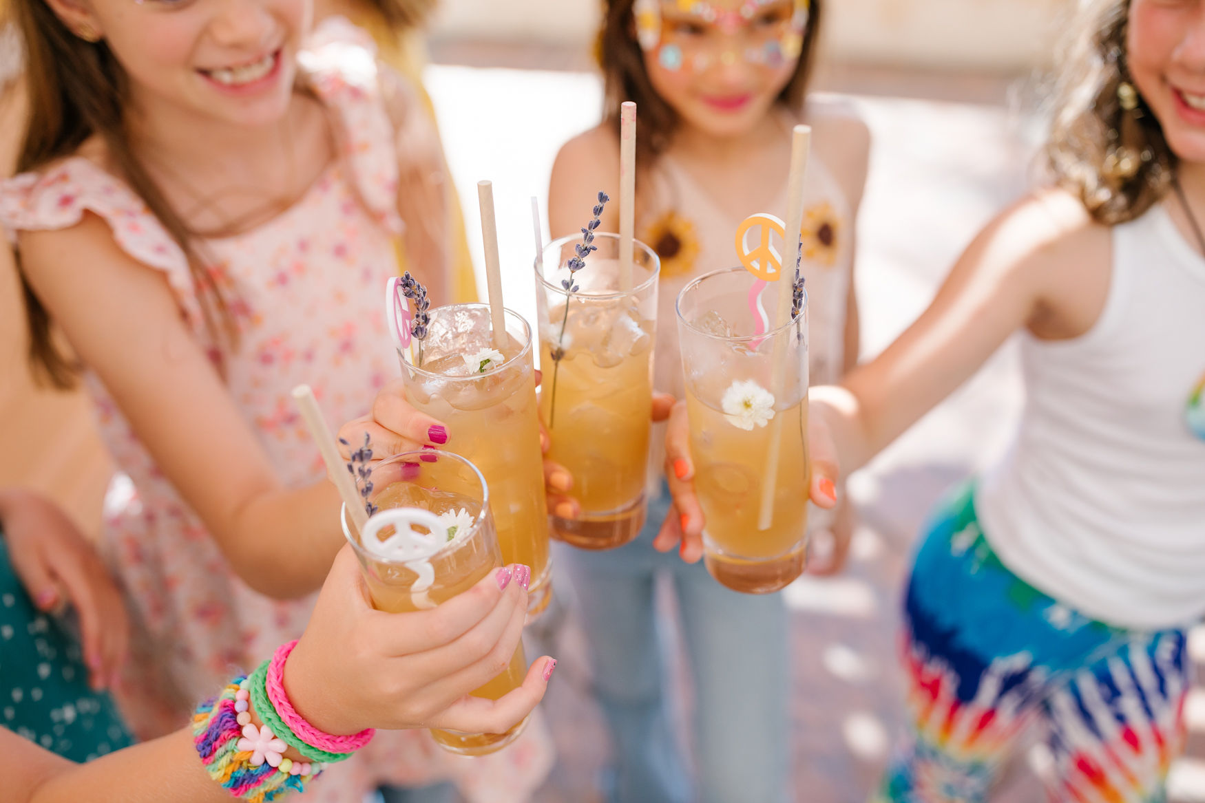 retro girls party ideas with peace sign drink stirs