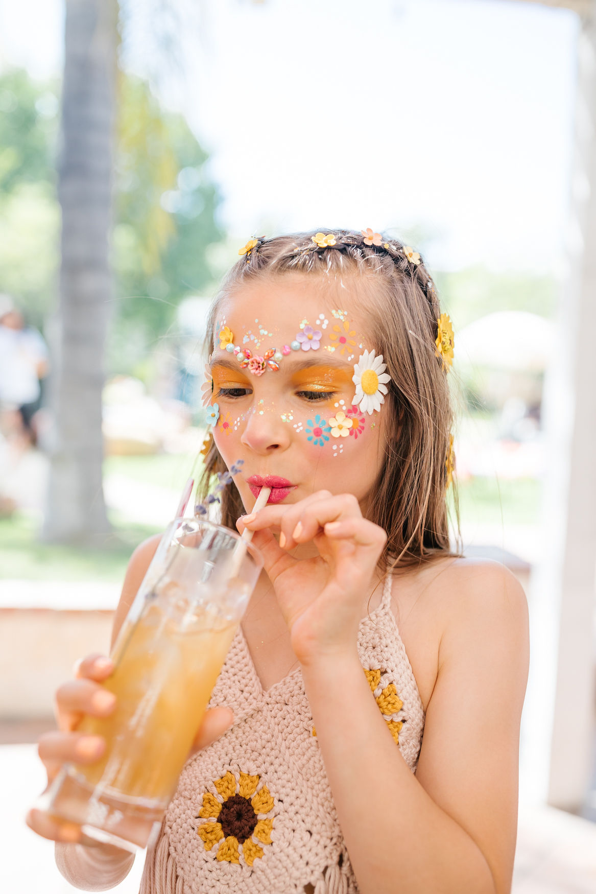 fun hippie face painting for groovy girls birthday party