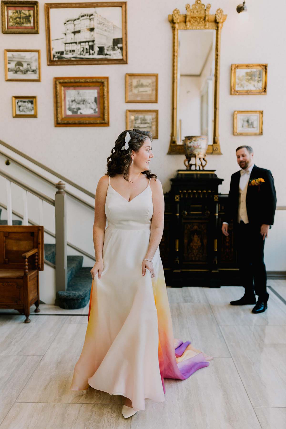 first look with bride wearing colorful wedding dress