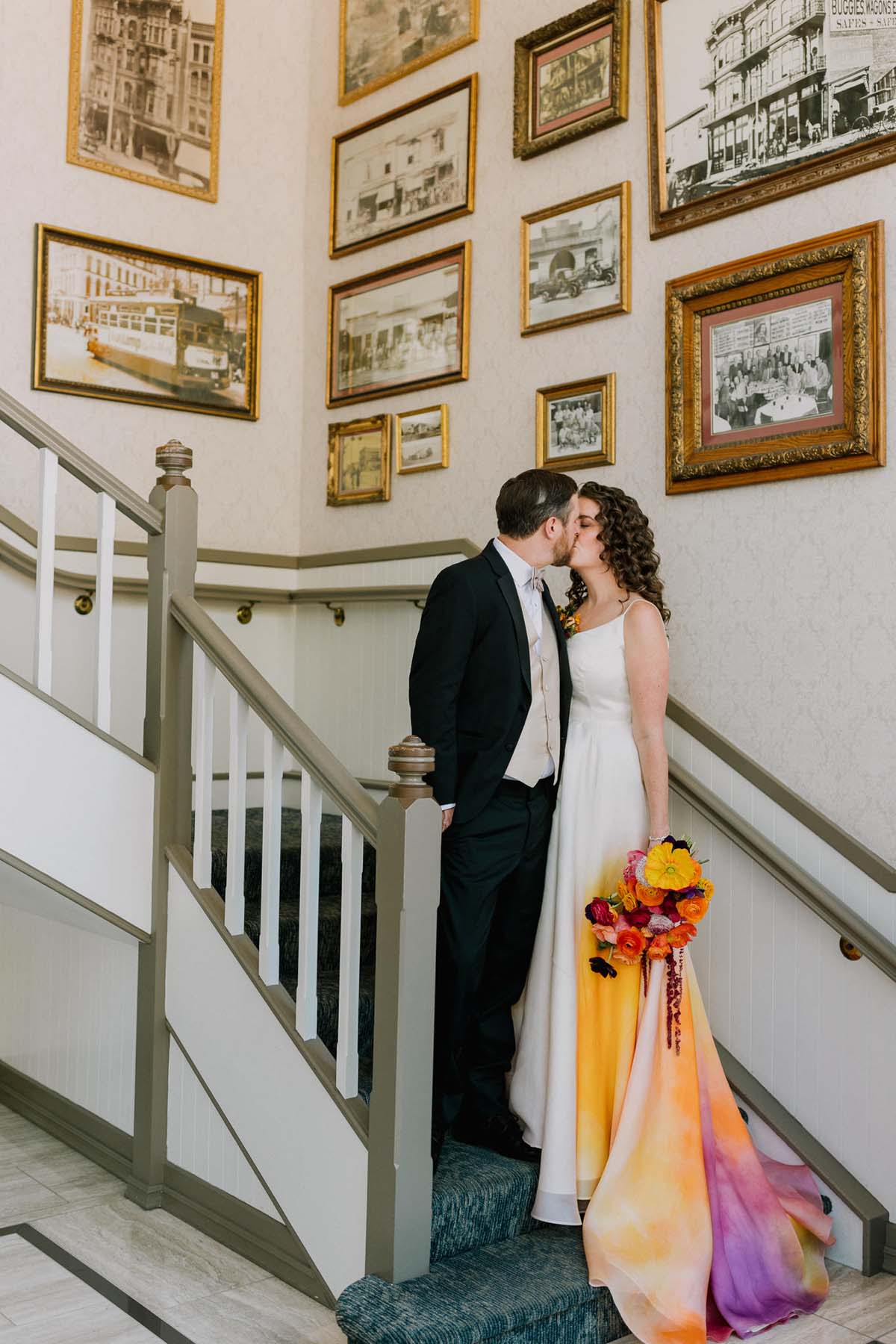 first look with bride wearing colorful wedding dress