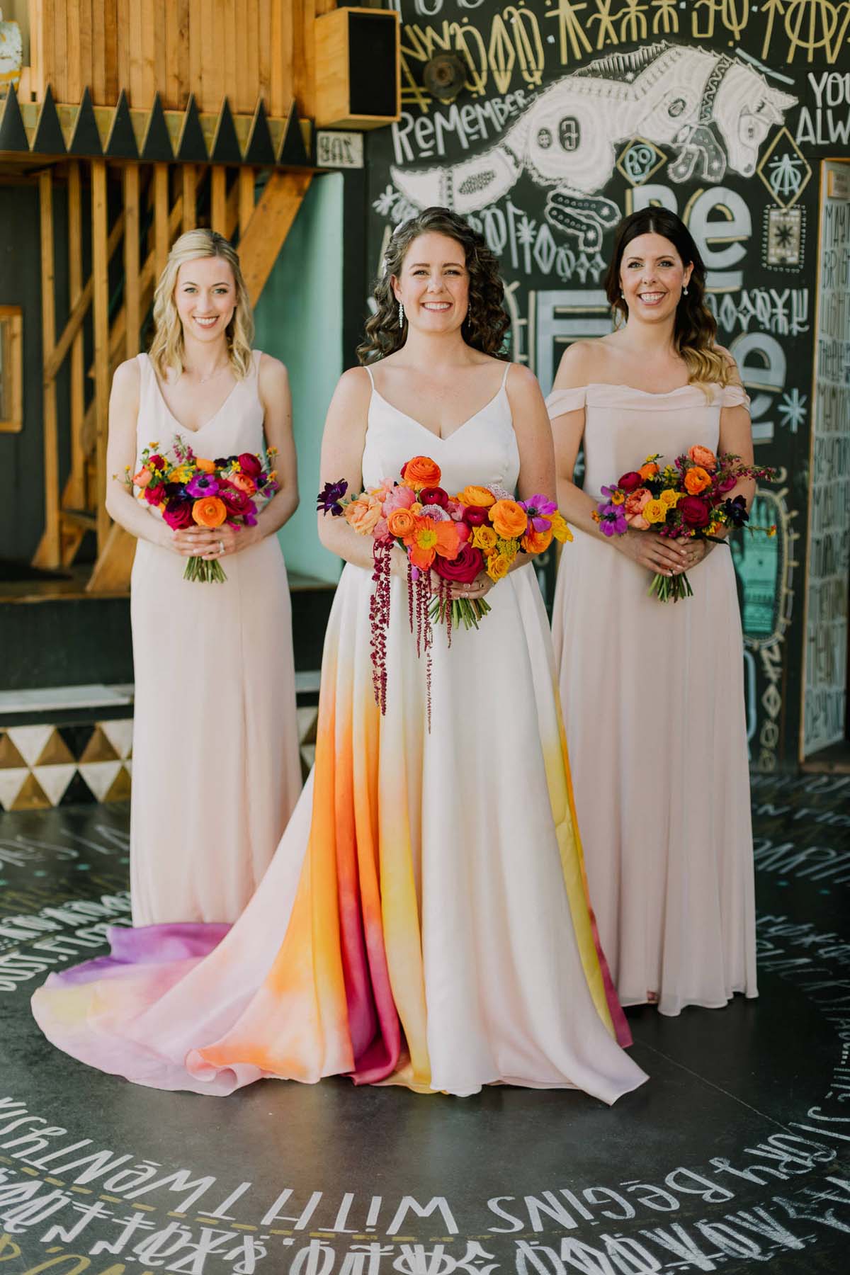 bridal party portraits with colorful orange wedding gown