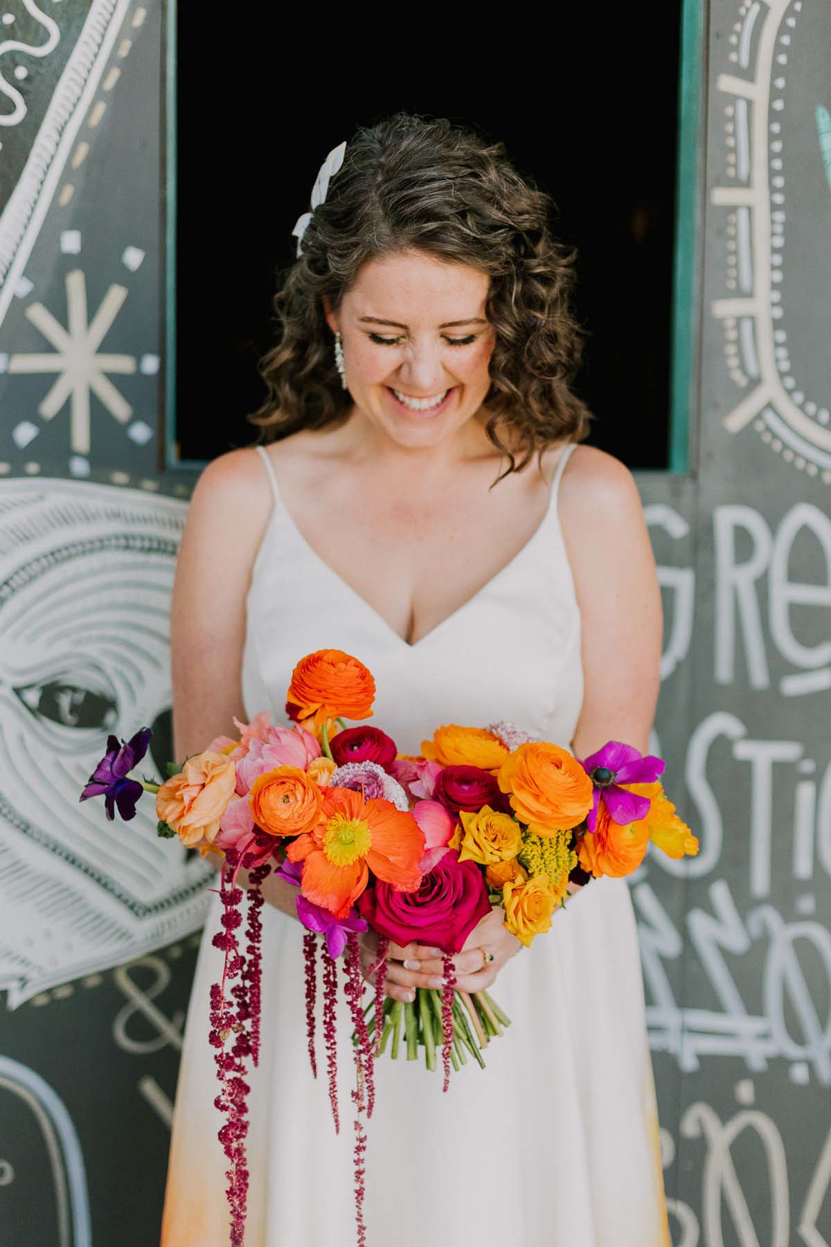 colorful orange and fuchsia bridal bouquet