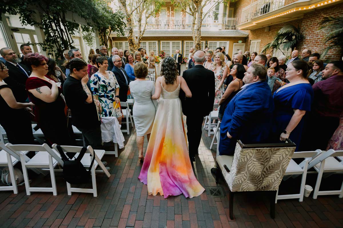 bride in colorful wedding dress at ceremony at New Children's Museum San Diego