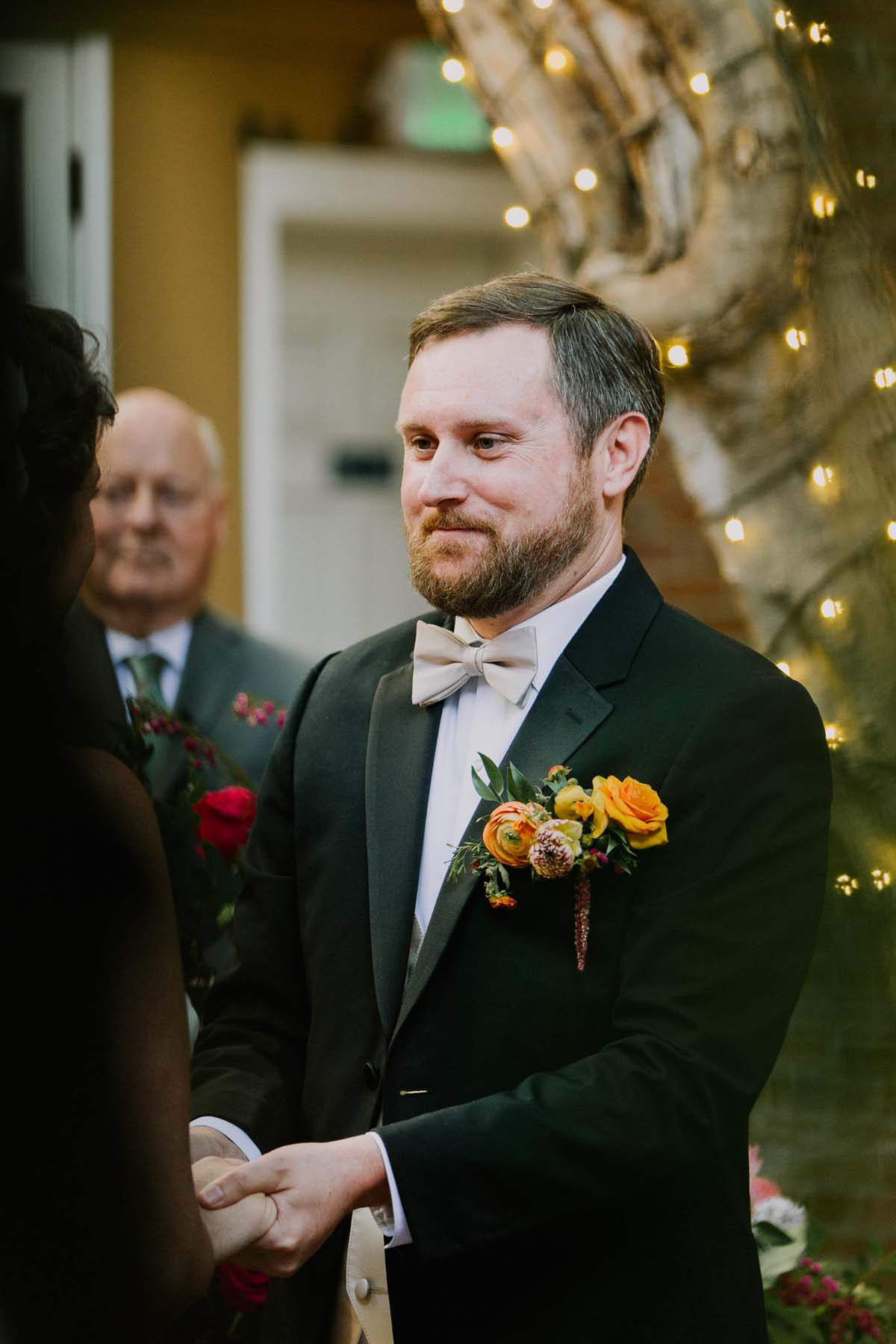 groom at ceremony at New Children's Museum San Diego