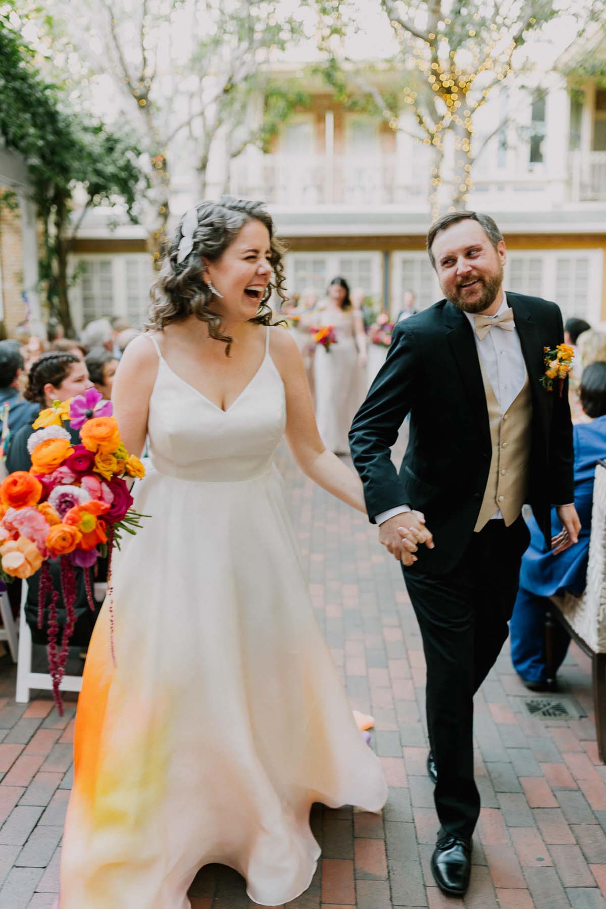 bride in colorful wedding dress at ceremony at New Children's Museum San Diego