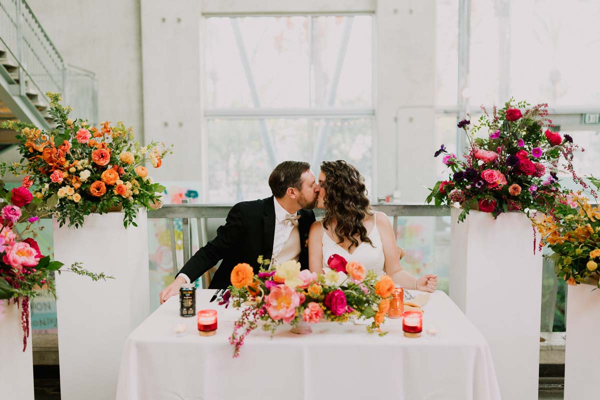 colorful rainbow tablescape at san diego museum wedding