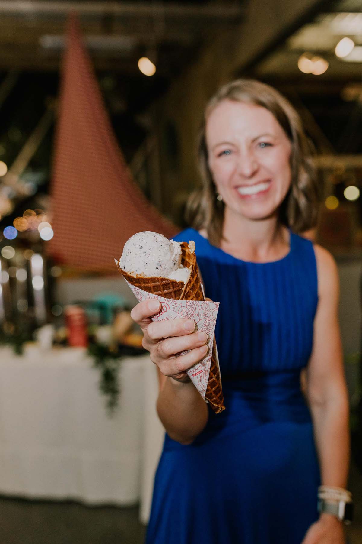 wedding guest holding ice cream