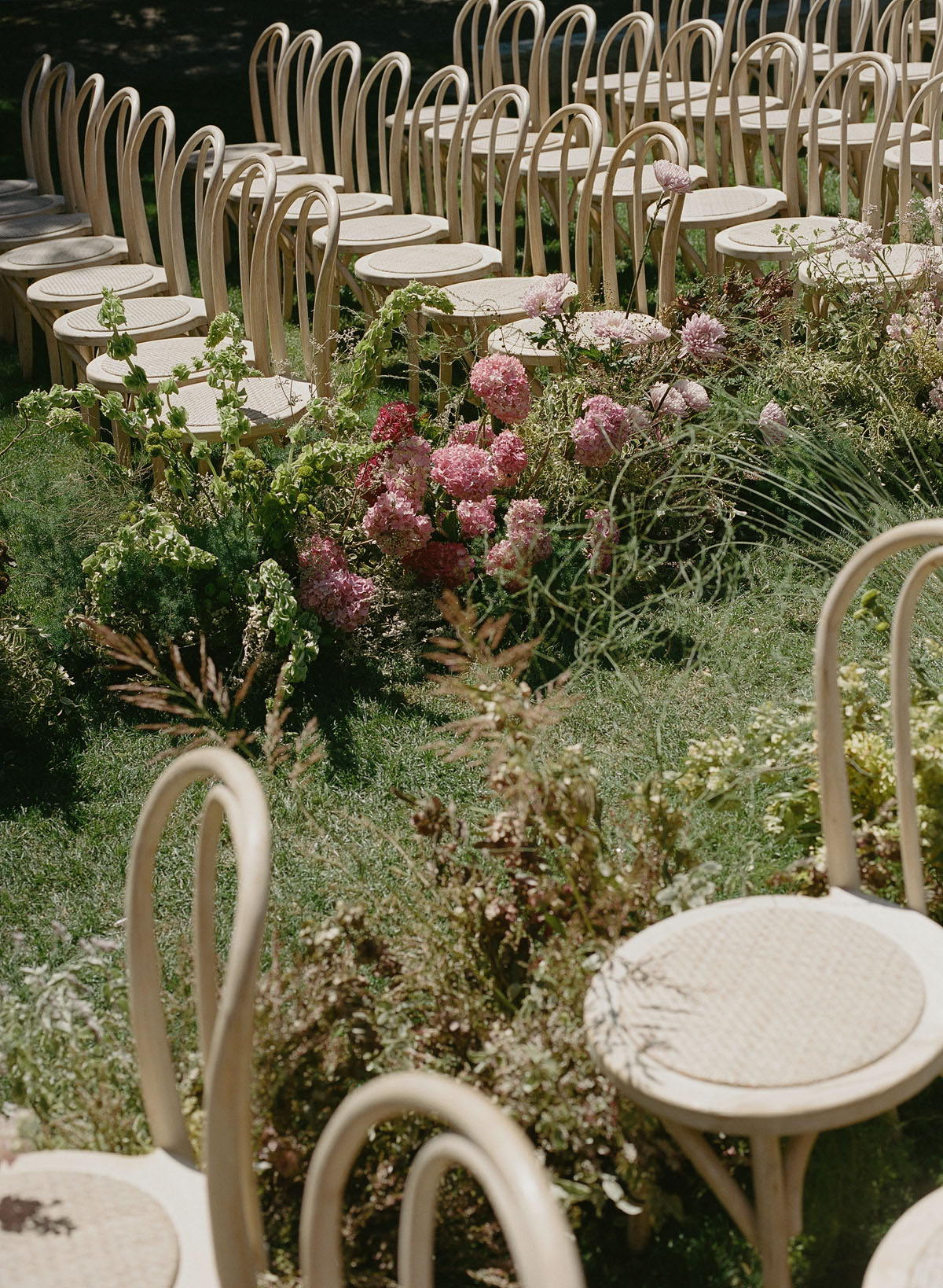 modern wild wedding aisle flowers at Carmel Valley Ranch