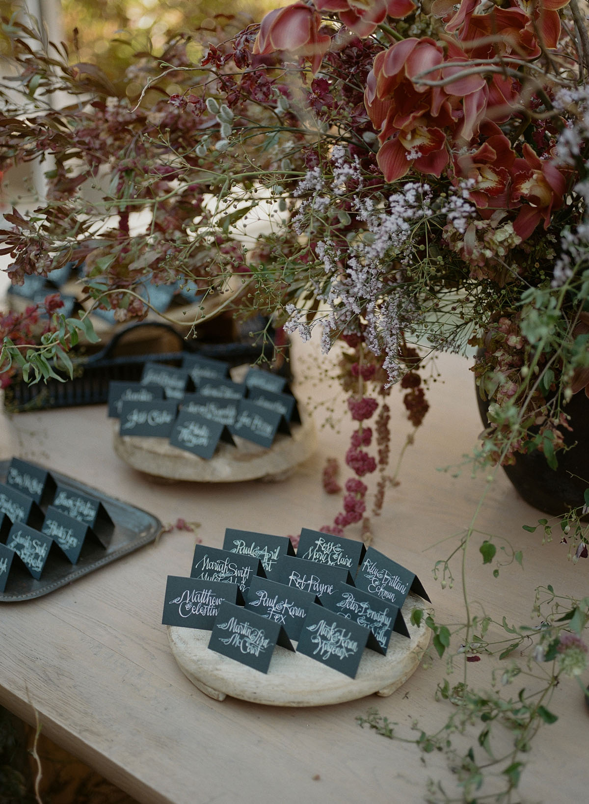 unique black and white calligraphy escort cards for fall wedding