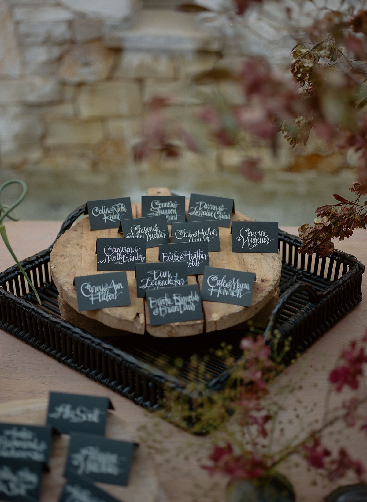 unique black and white calligraphy escort cards for fall wedding