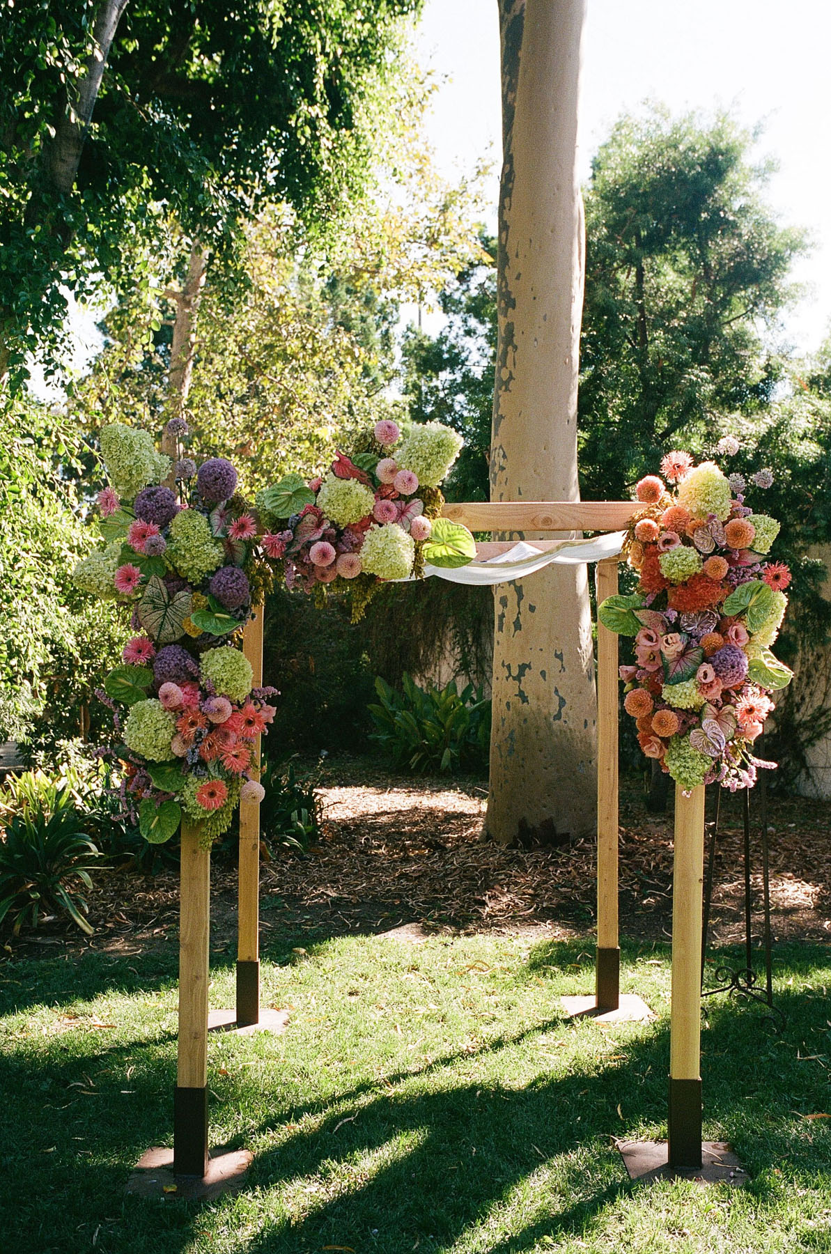 gorgeous pink, lilac, green floral chuppah for LA wedding