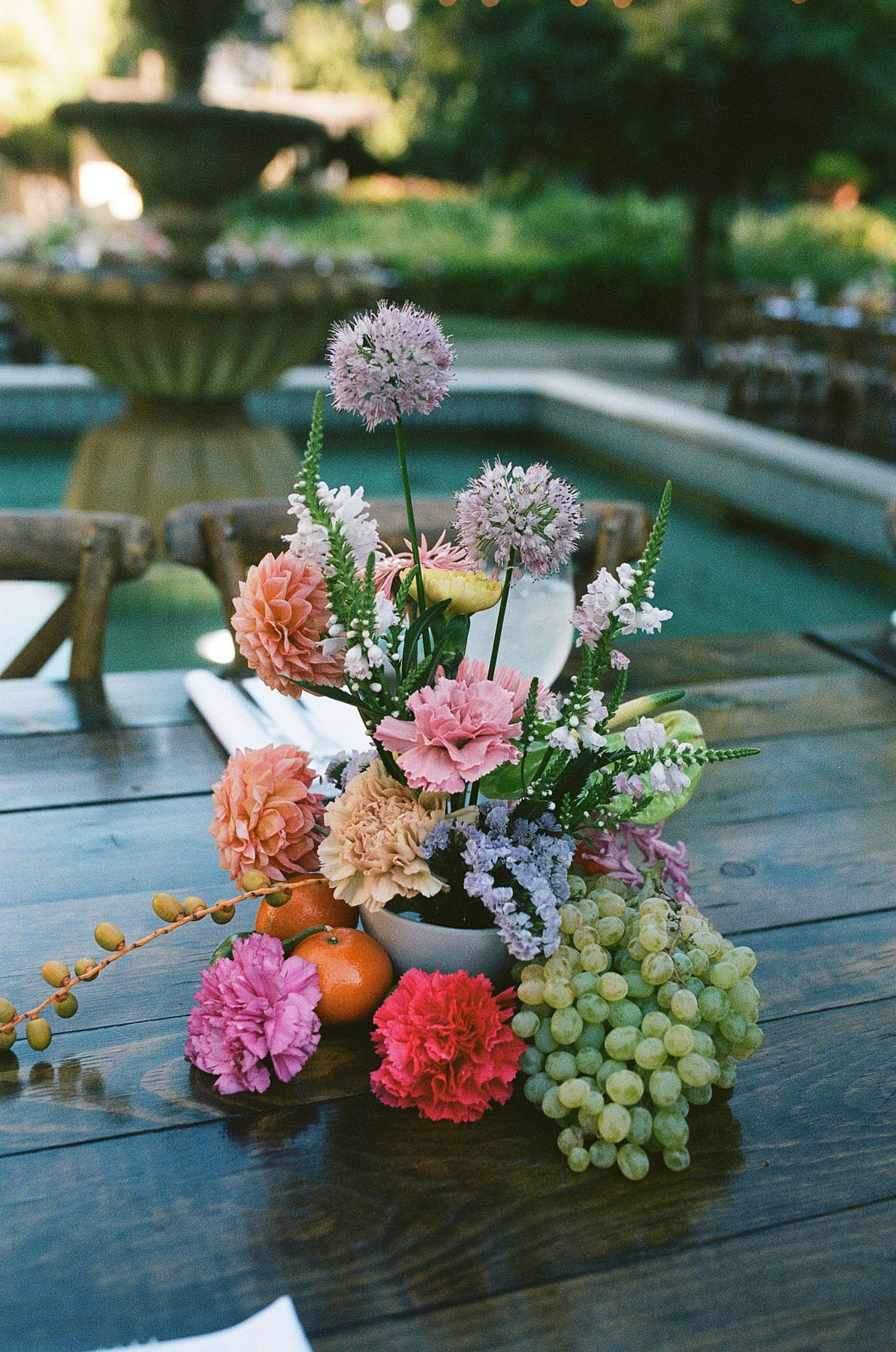 modern colorful wedding floral centerpieces with fruit