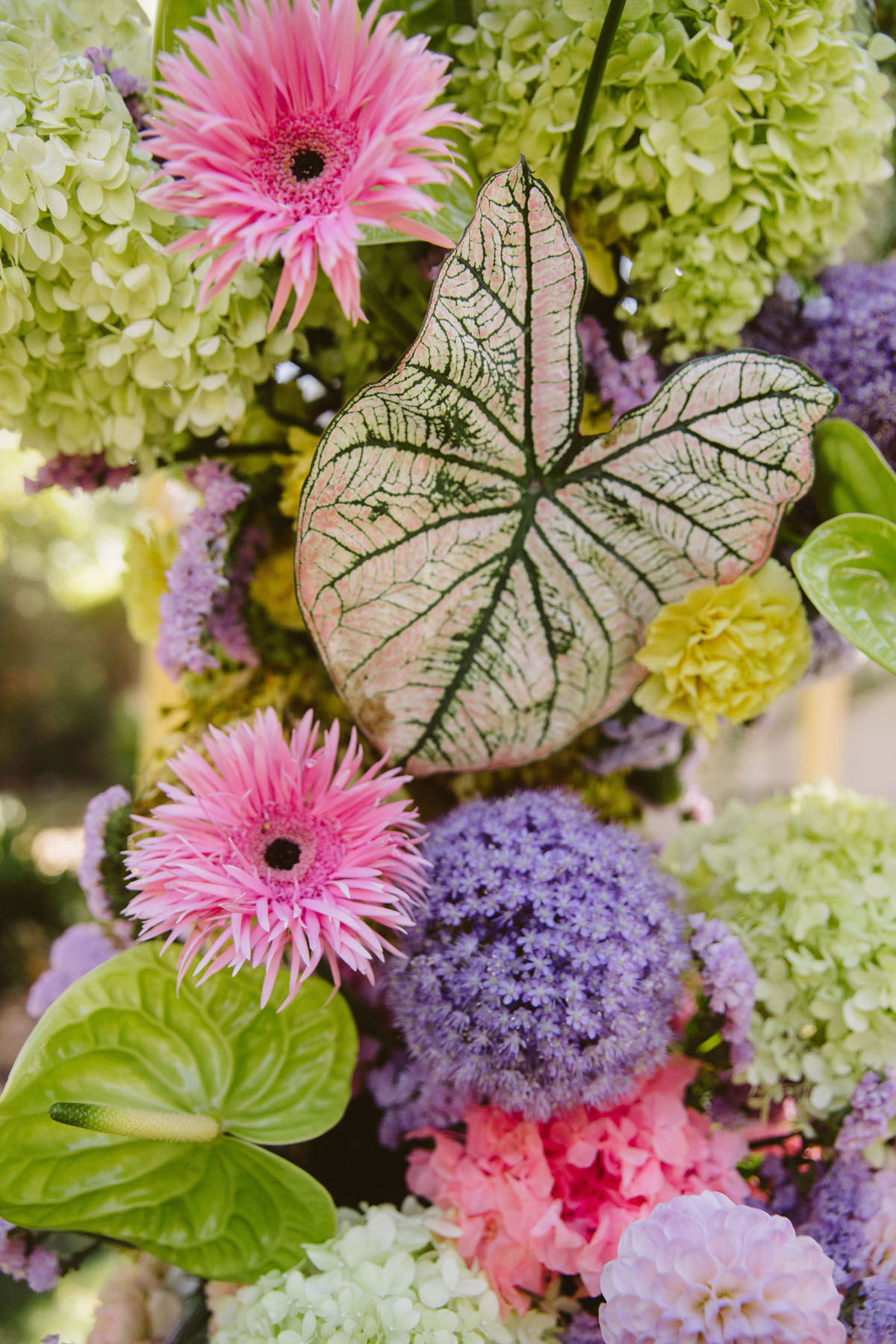 colorful pink, green, lilac floral chuppah for jewish wedding