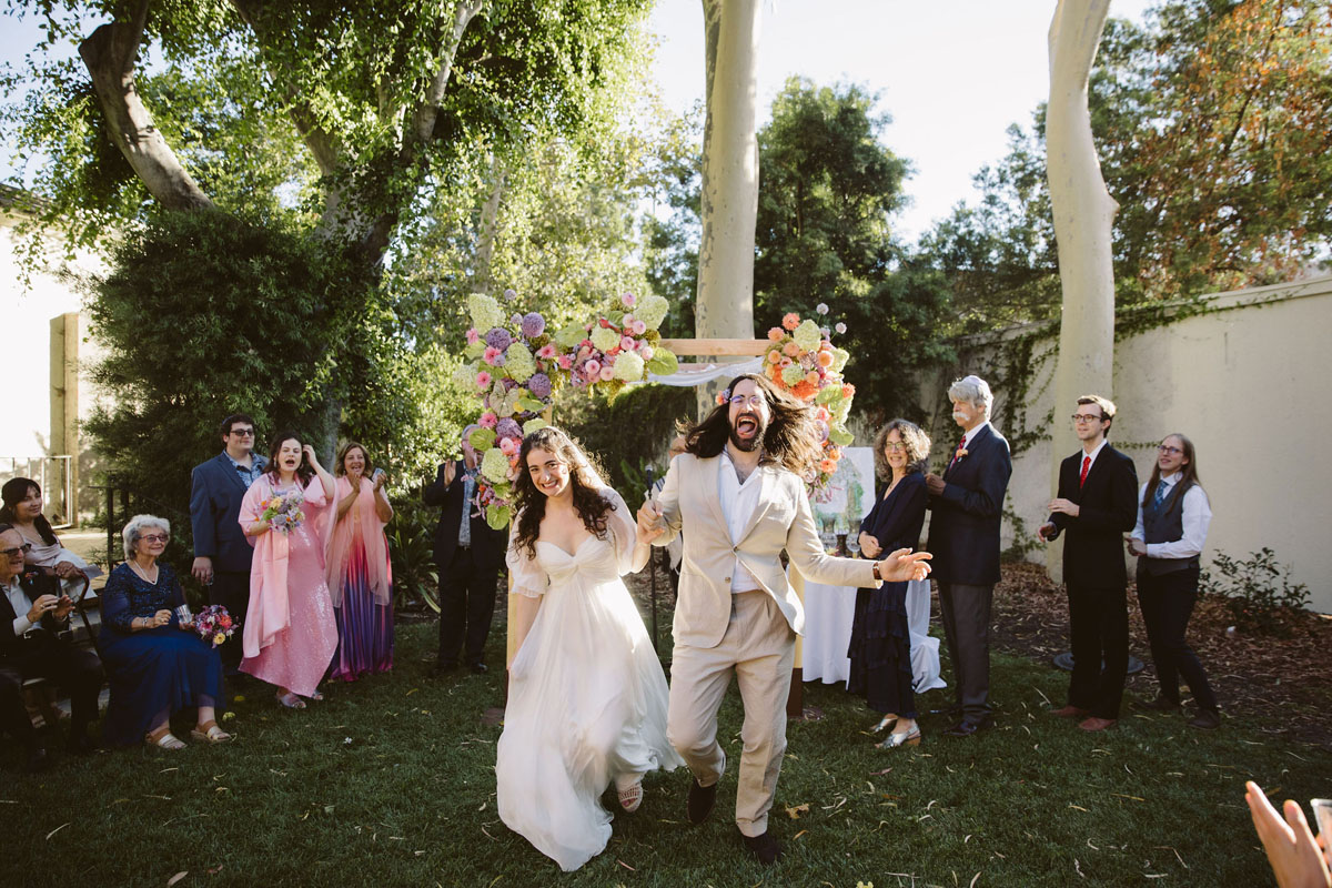 bride and groom at colorful jewish wedding ceremony in Los Angeles