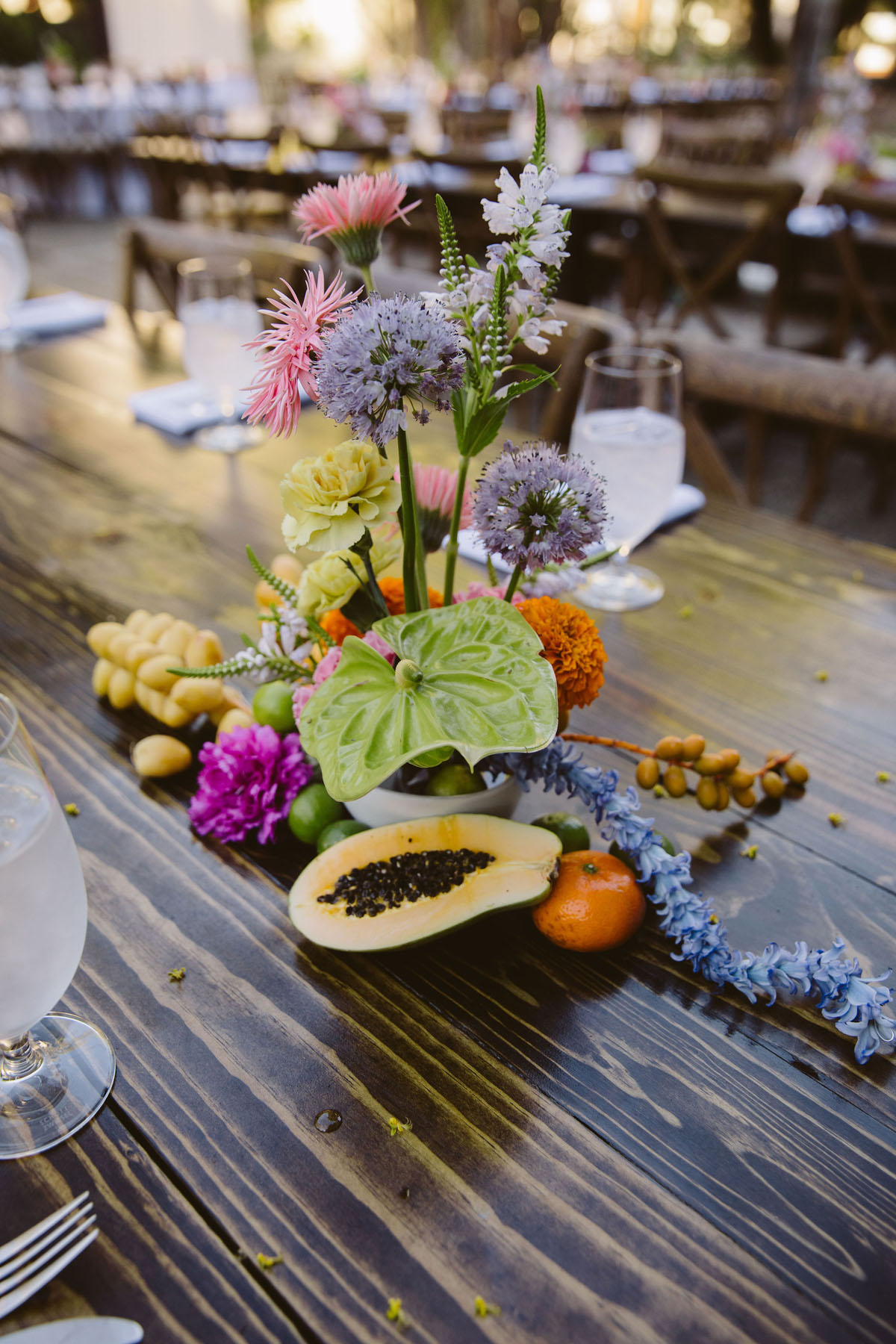 modern colorful wedding floral centerpieces with fruit