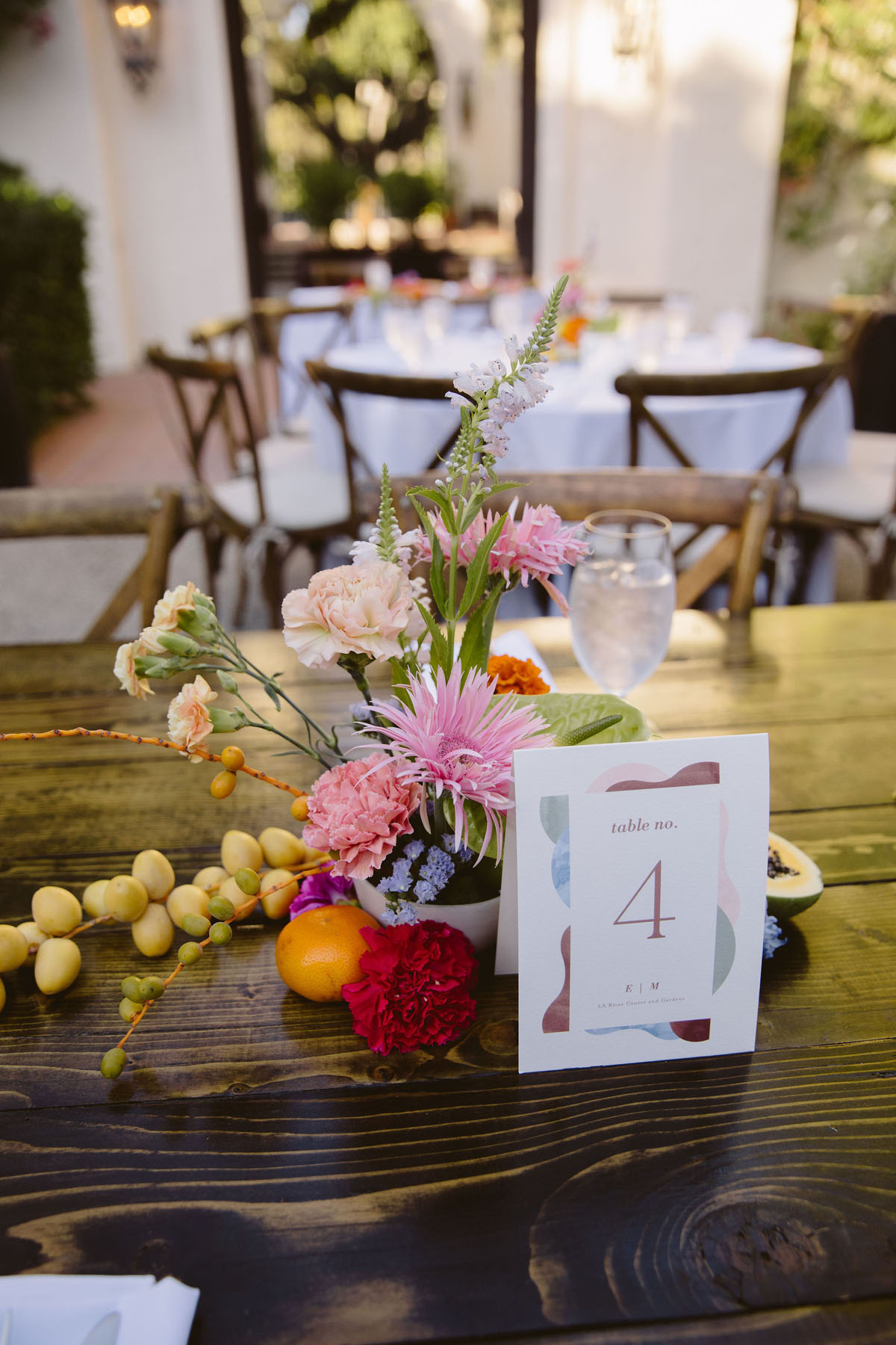 modern colorful wedding floral centerpieces with fruit