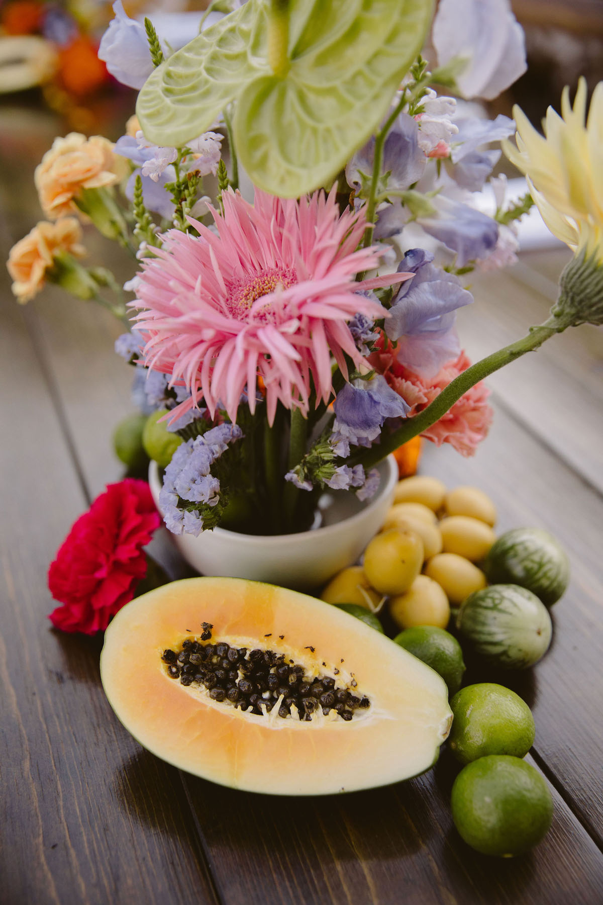 modern colorful wedding floral centerpieces with fruit