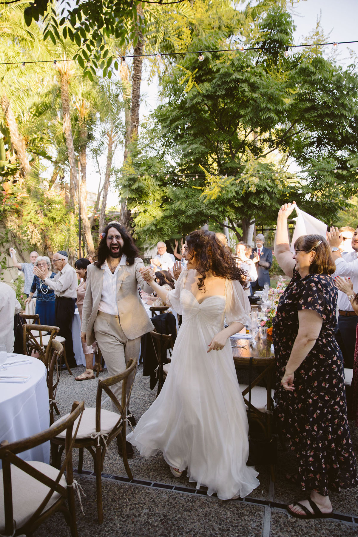 bride and groom entering reception at LA wedding