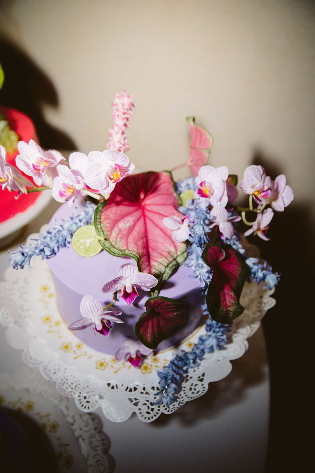 pink purple and green funky wedding cakes with leaves and flowers