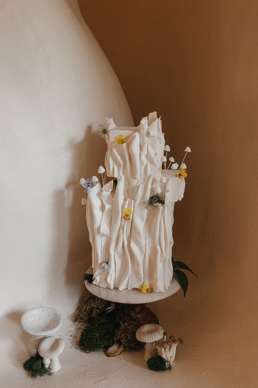 textural wedding cake with mushroom detail