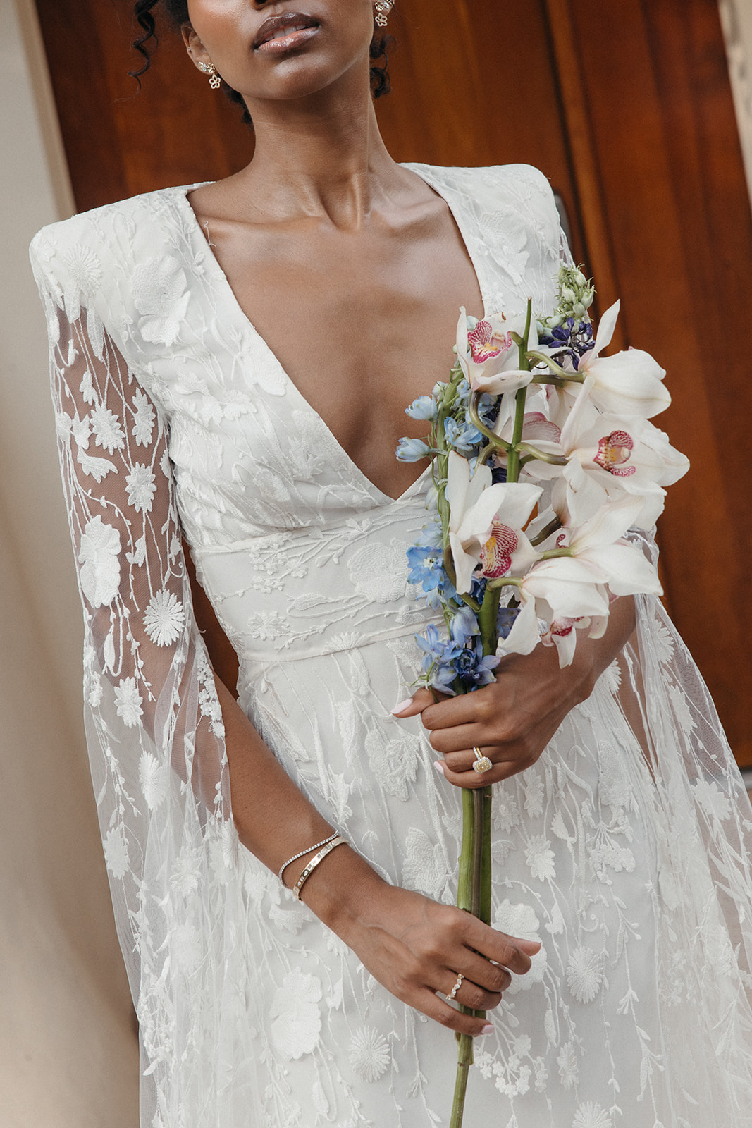 modern lace v neck wedding dress and minimalist bridal bouquet