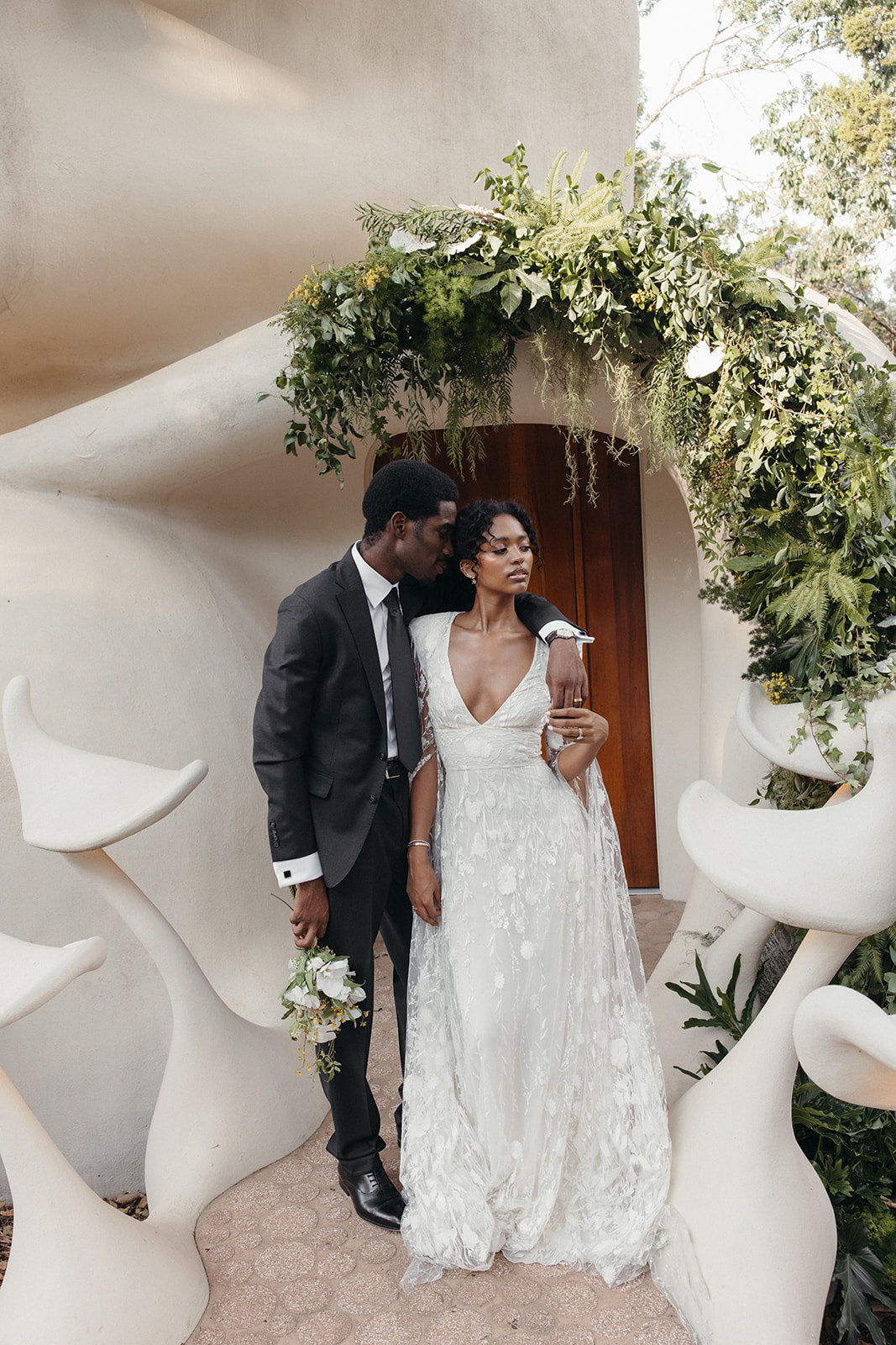 black couple wearing chic wedding fashion at unique Austin venue