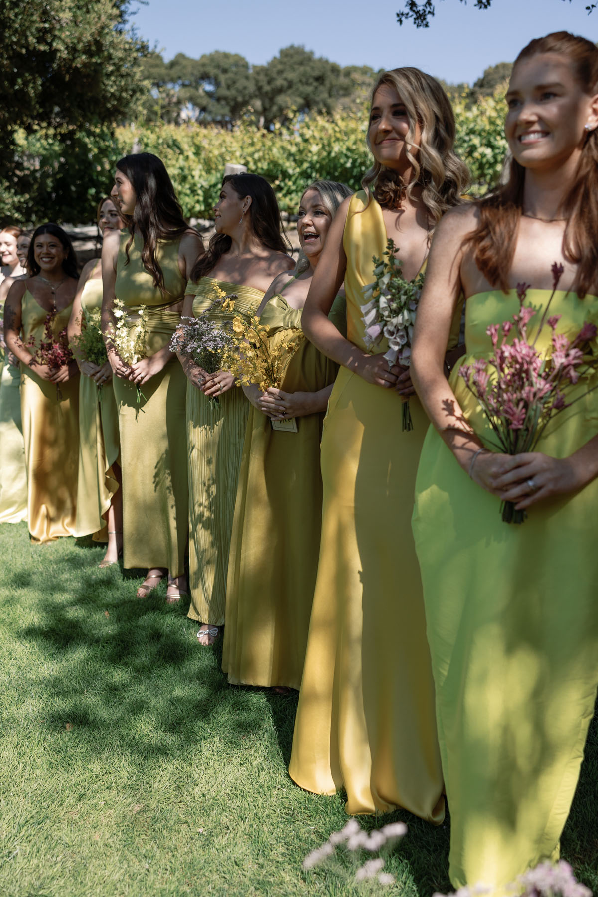 citrus bridesmaids dresses in yellow and chartreuse