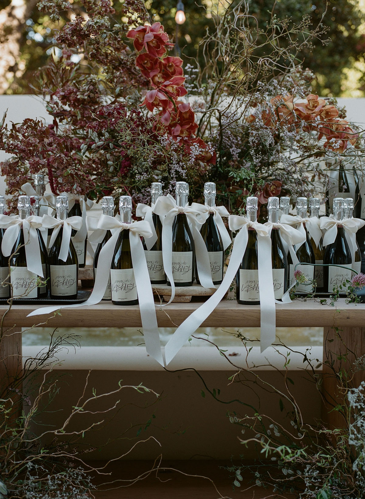 custom wine labels and bows for fall wedding in California